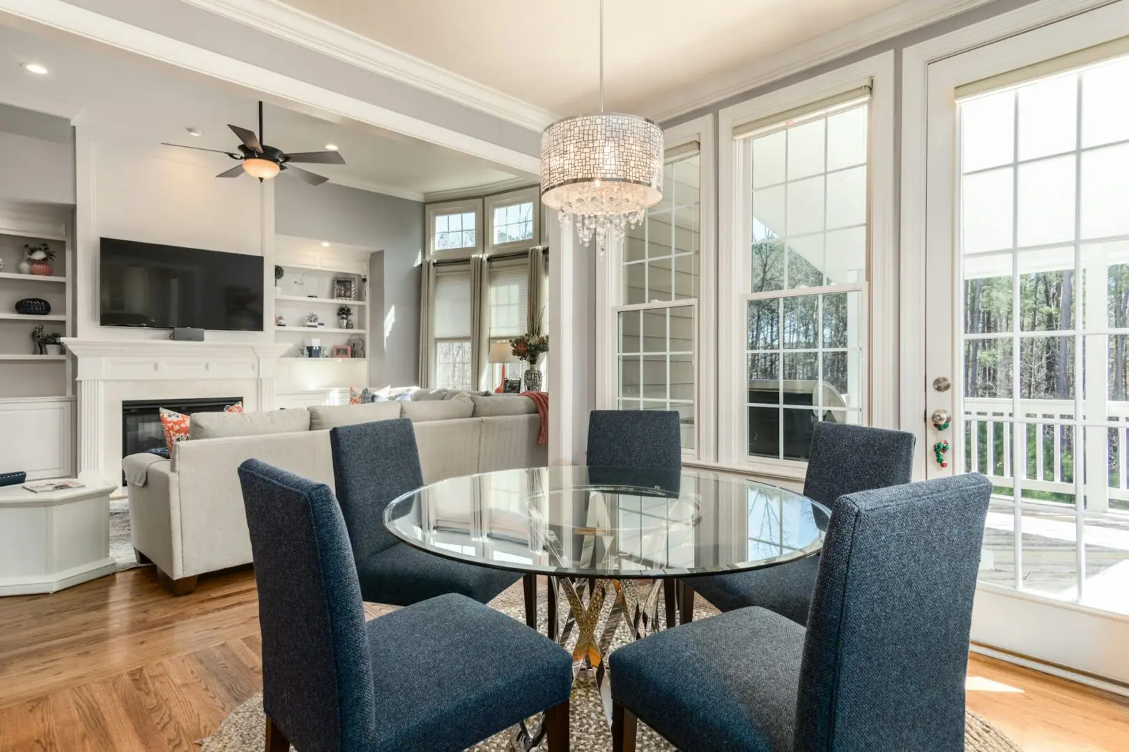 Modern living room with glass dining table