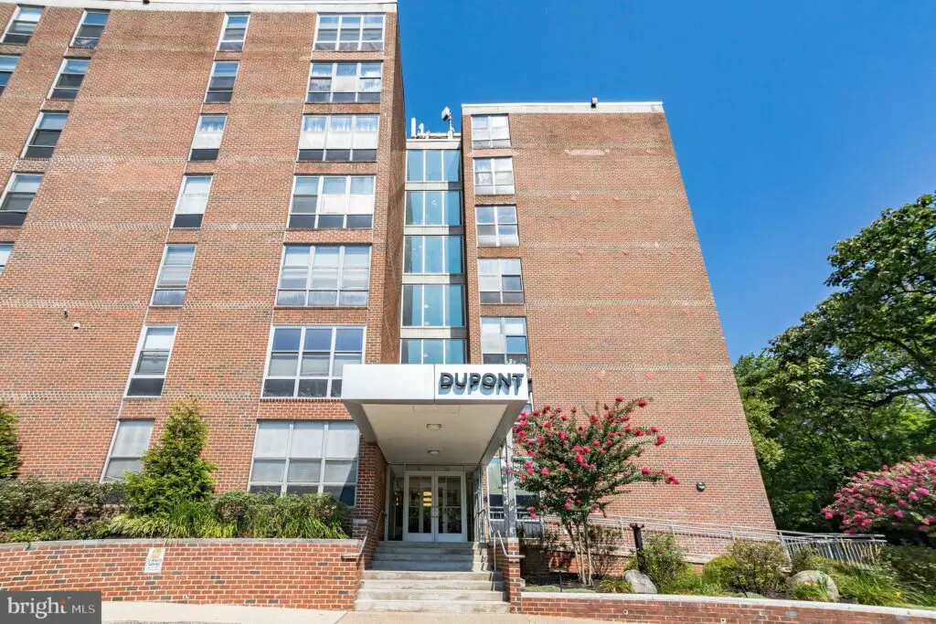 Dupont apartment building entrance with brick facade