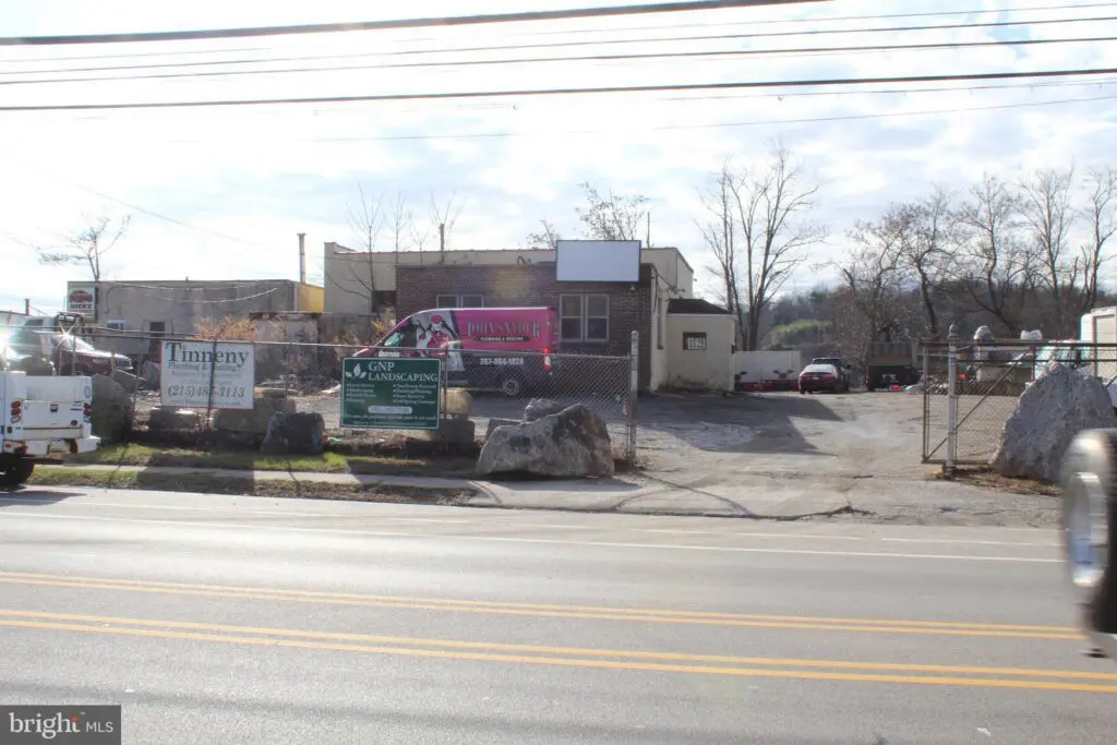 Commercial property with building and parked trucks
