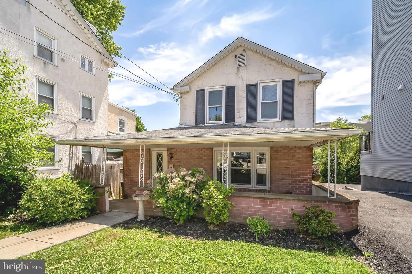 Two-story house with covered front porch