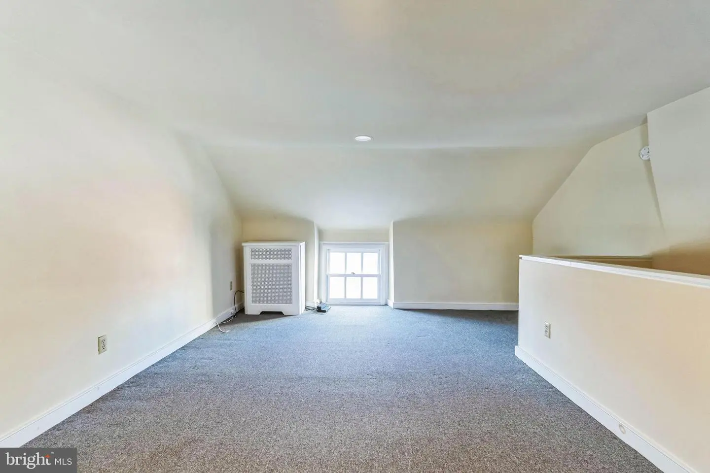 Finished attic room with dormer window