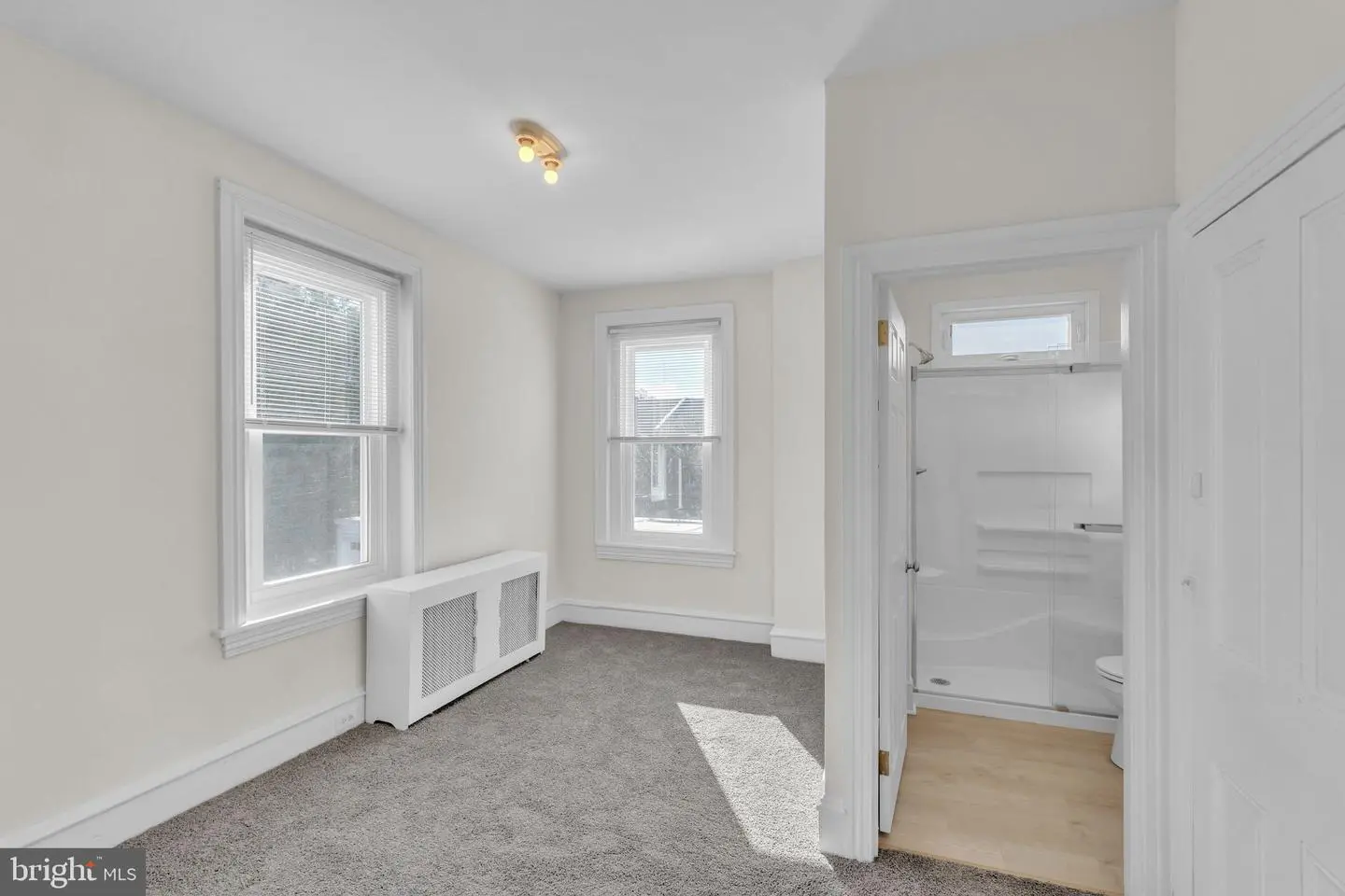 Bright small bedroom with ensuite bathroom