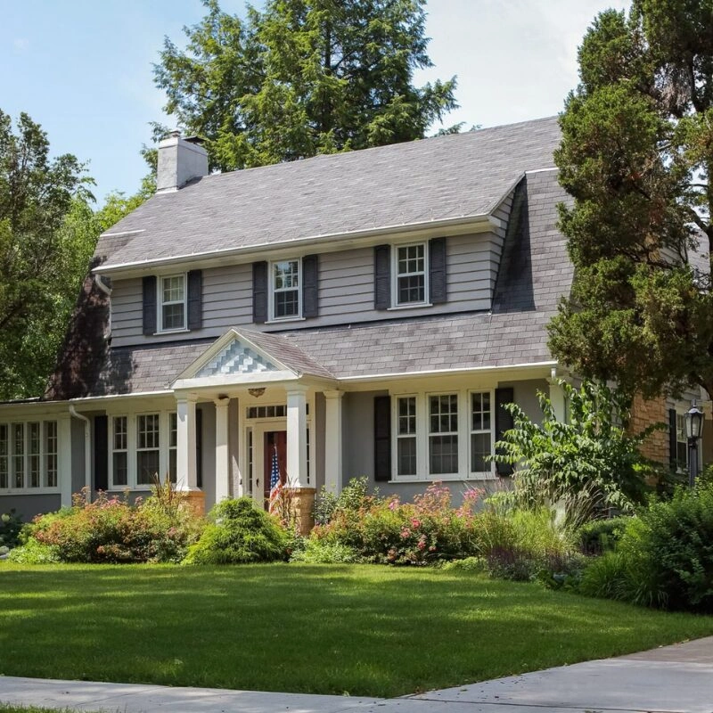 Suburban house with manicured lawn