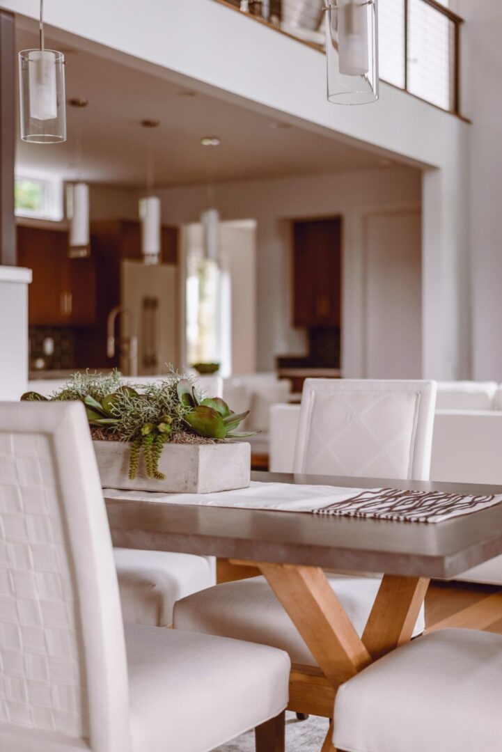 Modern dining room with white chairs