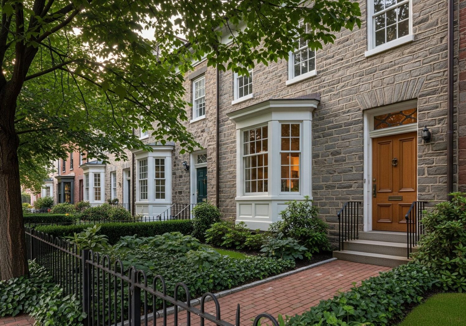Tree-lined street with charming townhouses